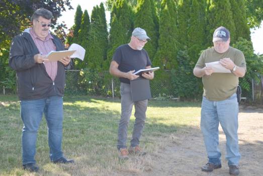 Kip Schumm, Jeff Nicodemus and Paul Newcomer go over some business at the Syracuse park board meeting Monday, June 10. InkfreeNews photo by Phoebe Muthart.